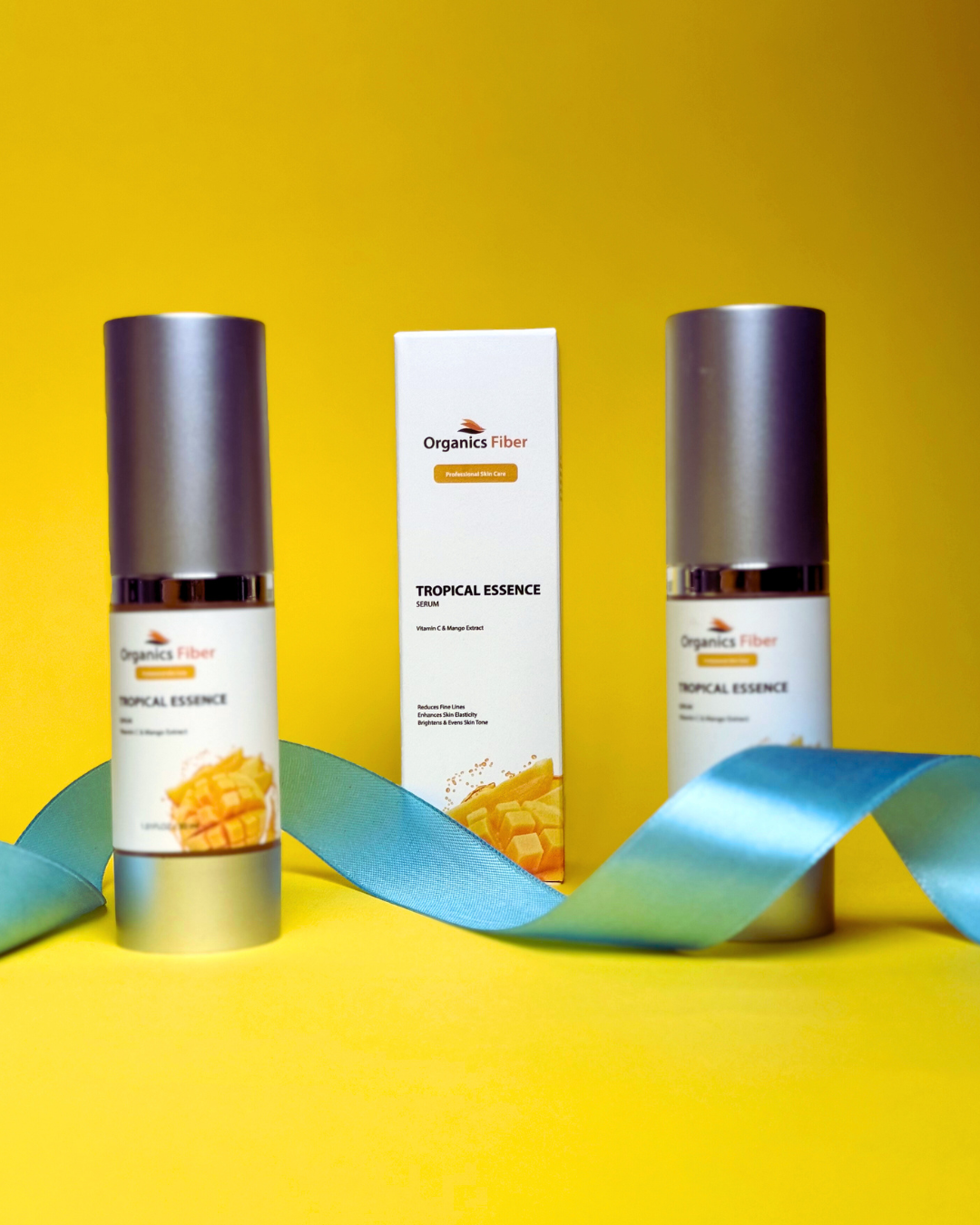 Tropical Essence anti-aging serum bottle with Vitamin C, mango extract, and collagen – skincare product for radiant skin